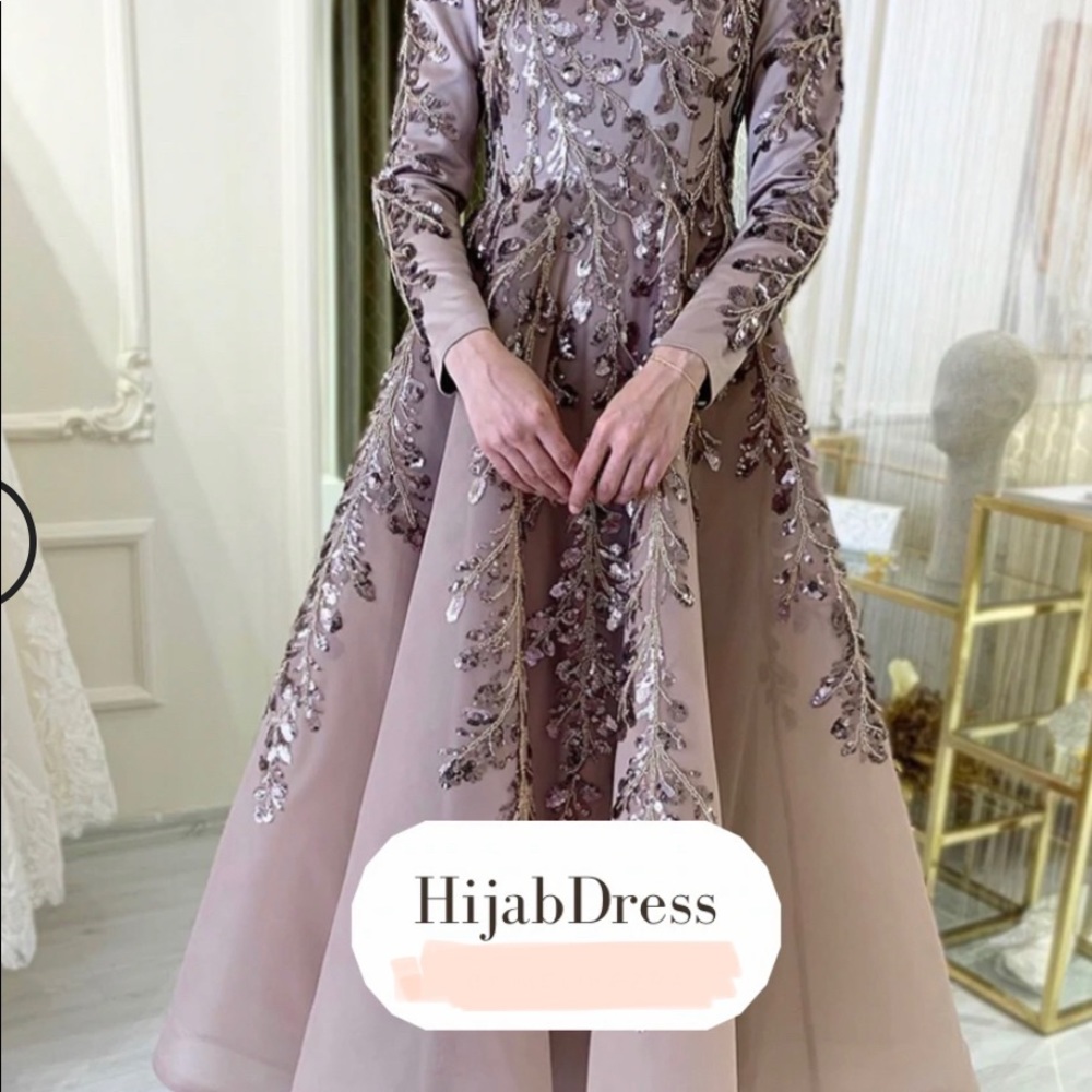 Hijab or modest evening gown, midi/ maxi.